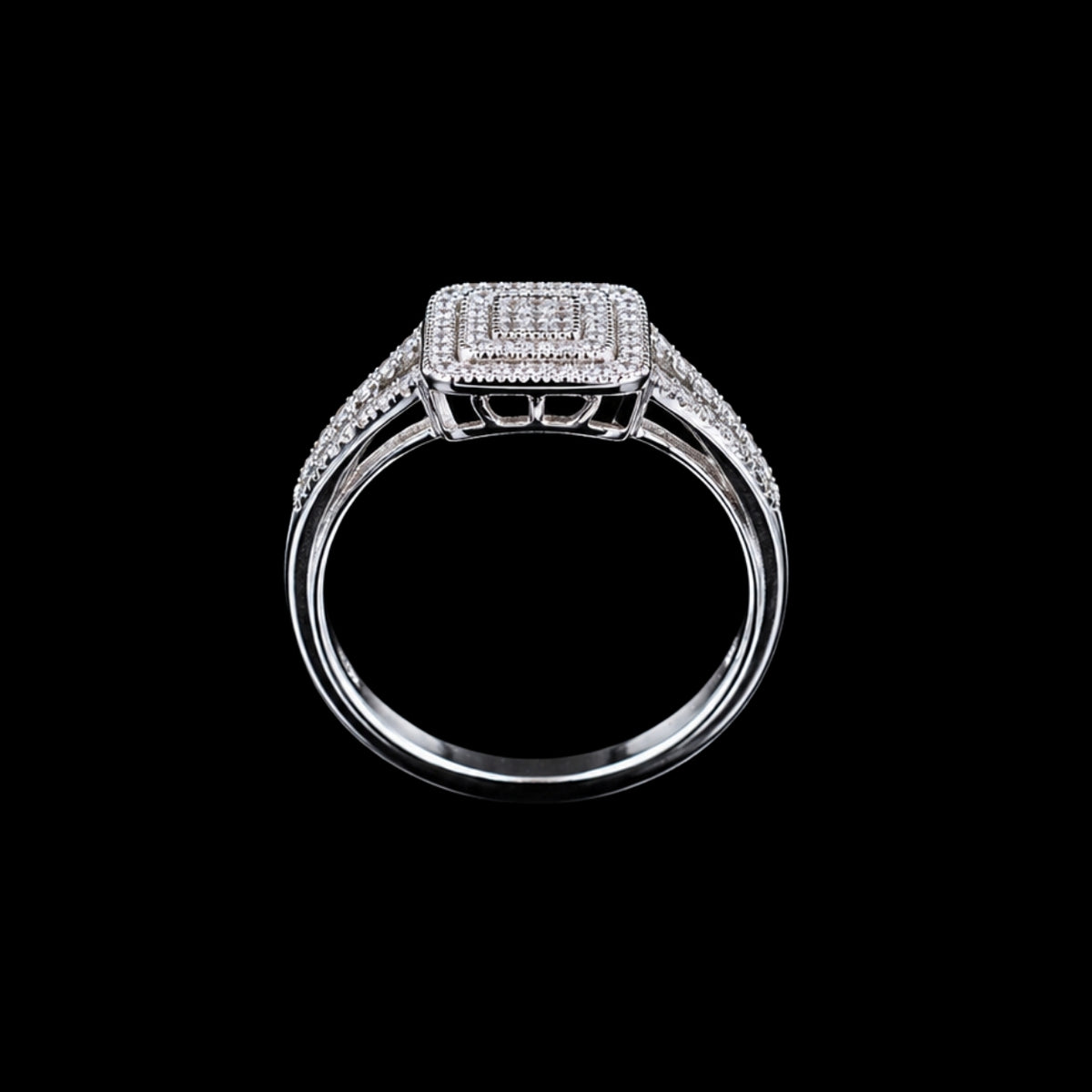 A silver ring with a square design and CZ stones