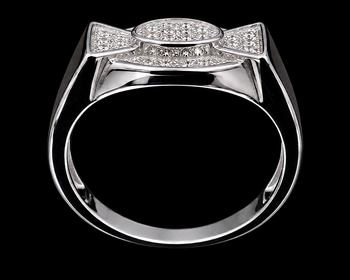 A silver ring with an oval design and CZ stones.