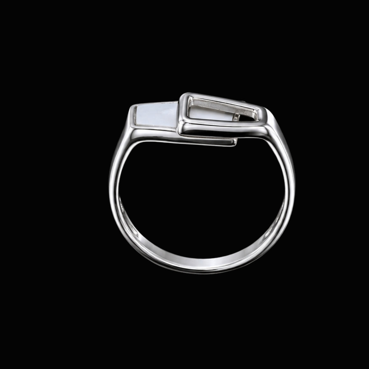 A silver ring with a rectangular CZ stone on a plain background.