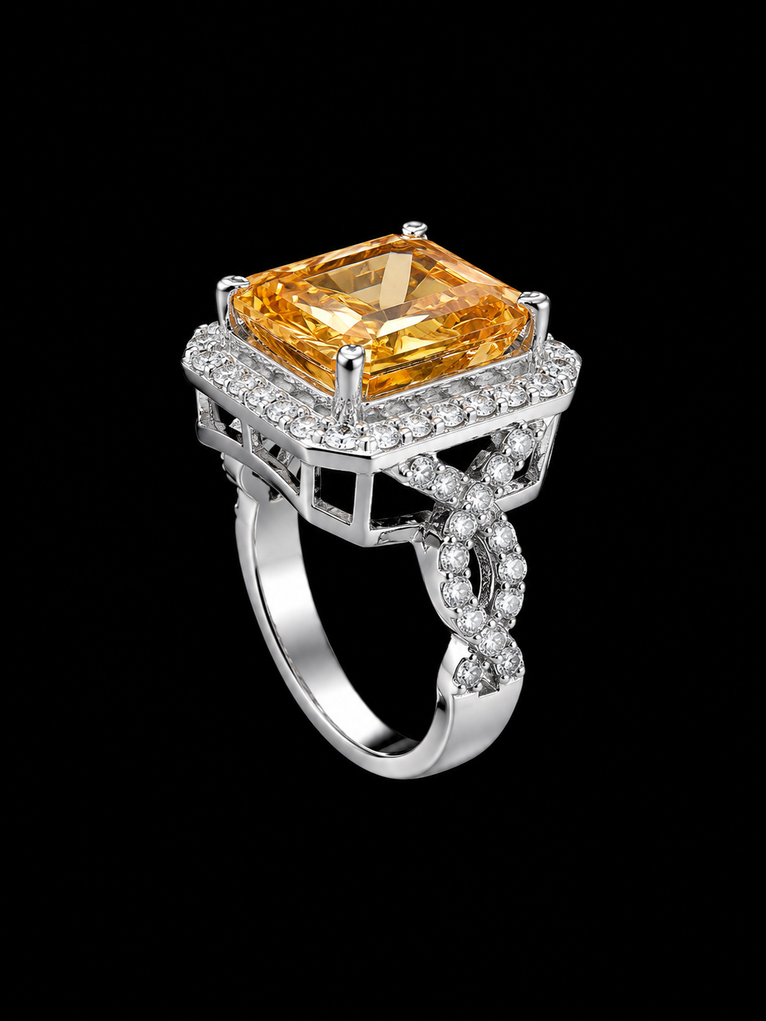 A silver-tone ring with a large citrine stone and small CZ stones.