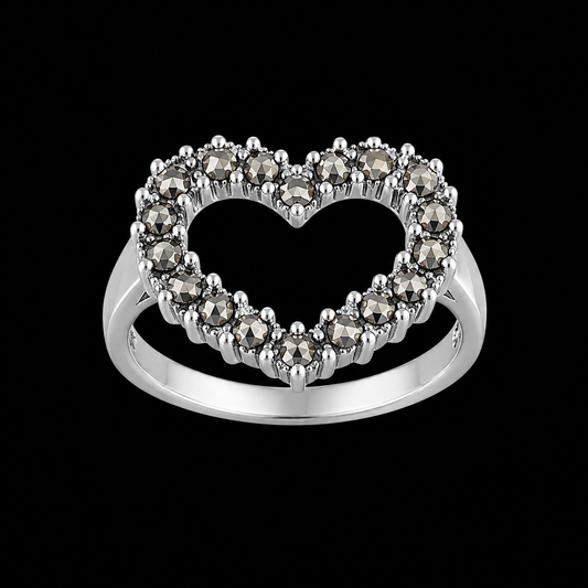 A silver ring with a heart-shaped design and CZ stones.