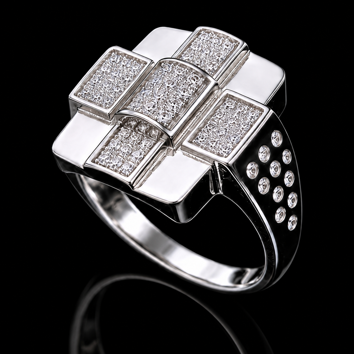 A silver ring with a cross design and clear cubic zirconia stones.