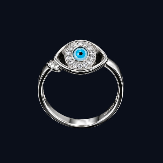 A silver-tone ring with an evil eye motif and CZ stones.
