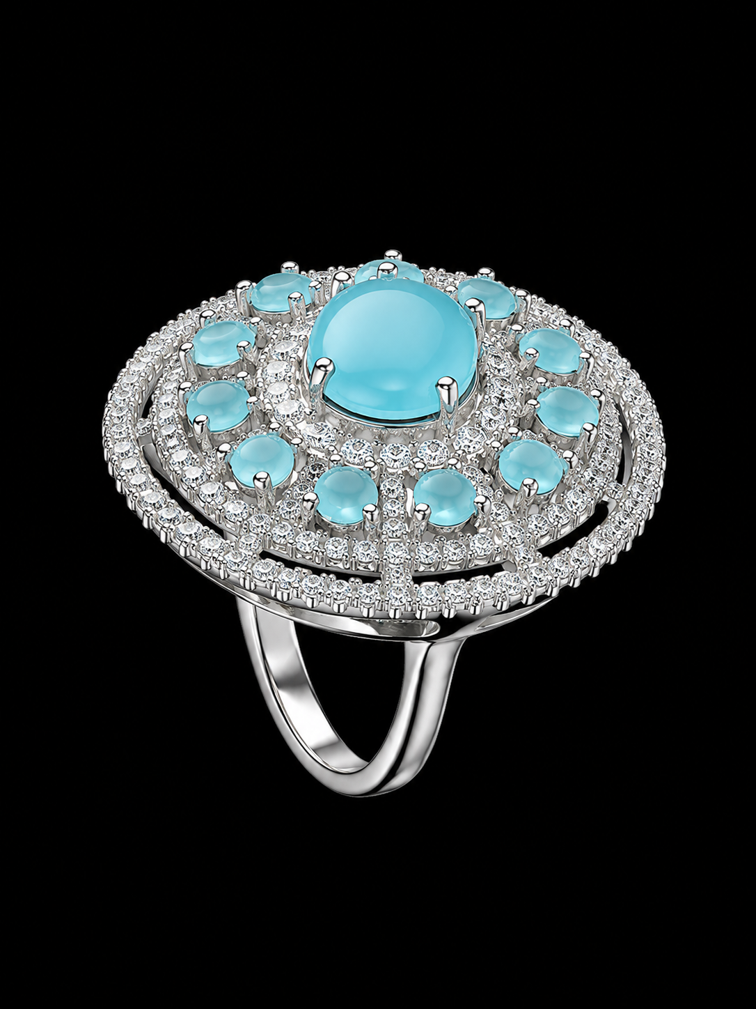 A silver-tone ring with a large blue stone and smaller blue and clear stones.