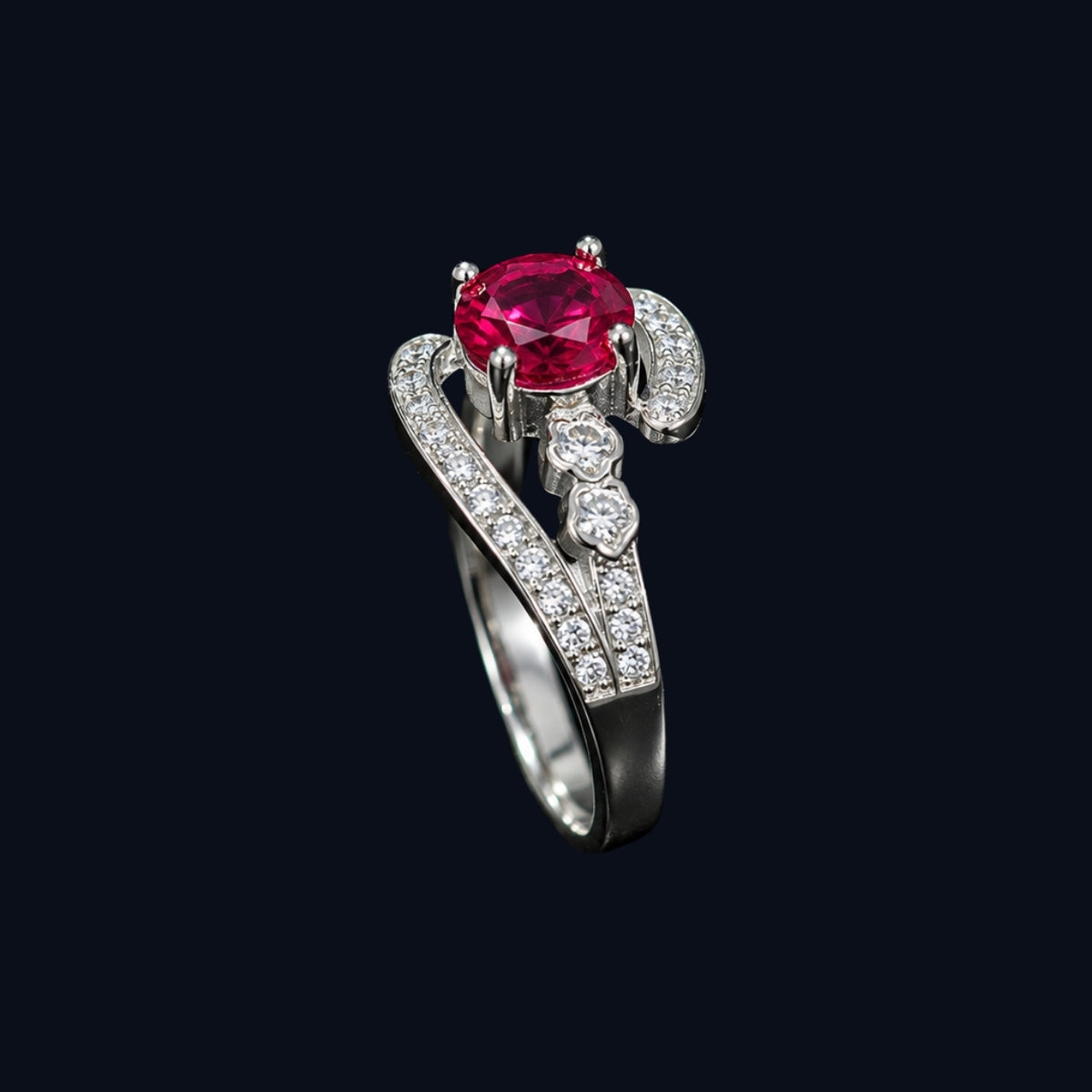 A silver ring with a ruby stone and CZ accents