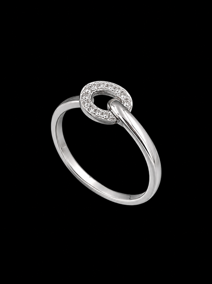 A silver ring with a knot design and CZ stones.