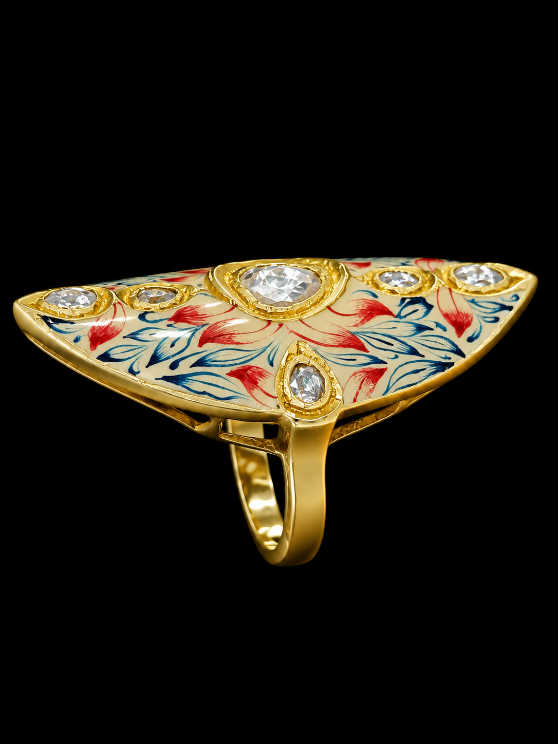 A gold ring with a triangular design and red and blue enamel work, featuring clear CZ stones.