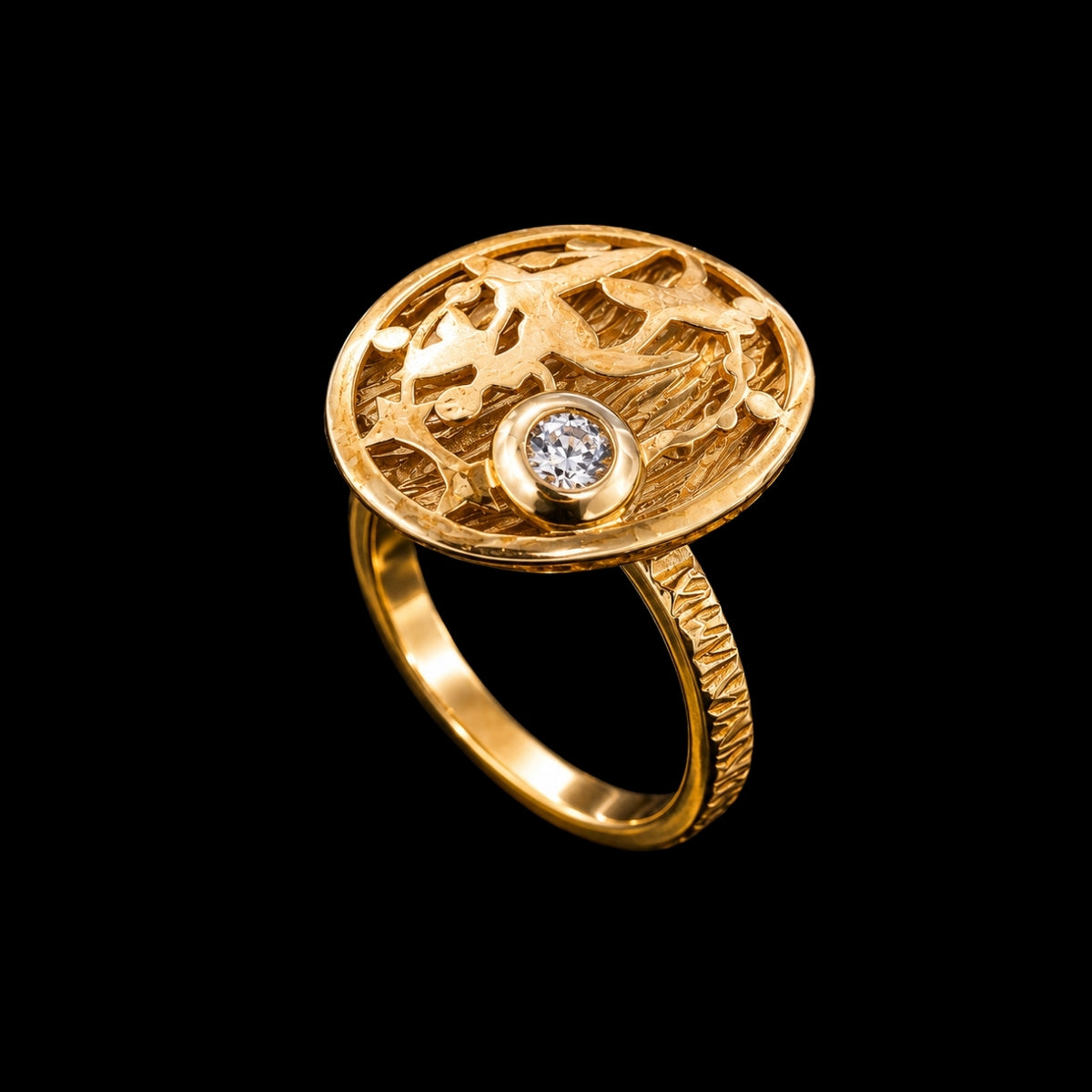 A gold ring with a round-cut CZ stone, featuring a floral design and adjustable band.