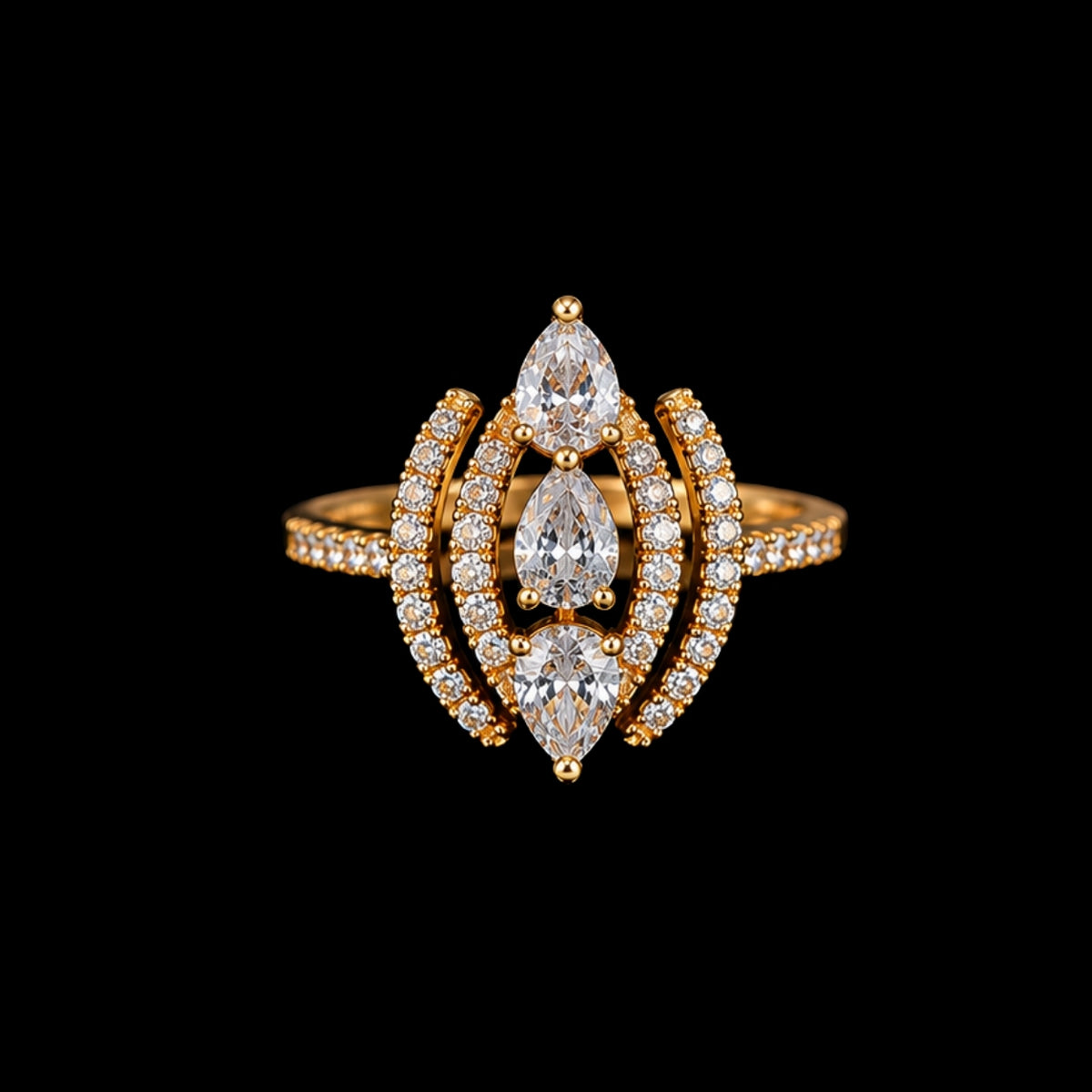 A gold ring with three marquise-cut clear CZ stones and smaller round CZ accents, set in a gold-tone metal.