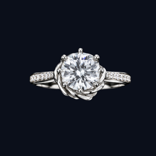 A silver ring with a round-cut CZ stone and rose gold setting.