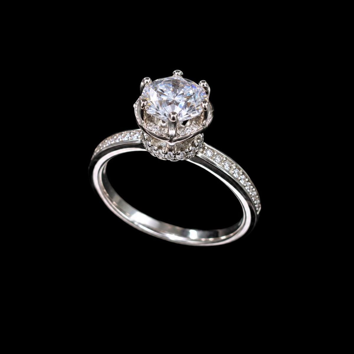 A silver-tone ring with a large clear cubic zirconia stone set in a crown design, surrounded by smaller stones.