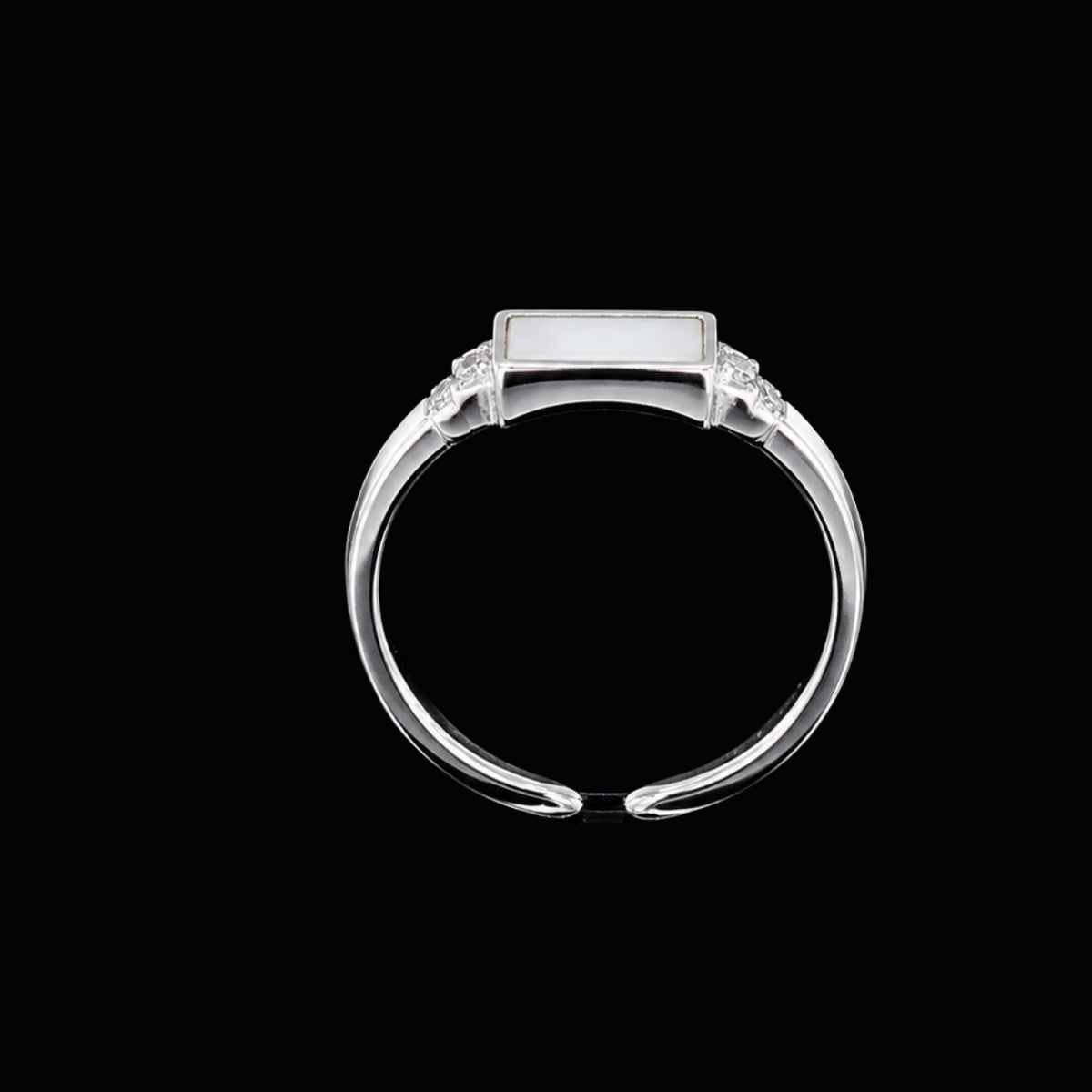 A silver bangle with enamel and CZ stones, featuring a floral design.