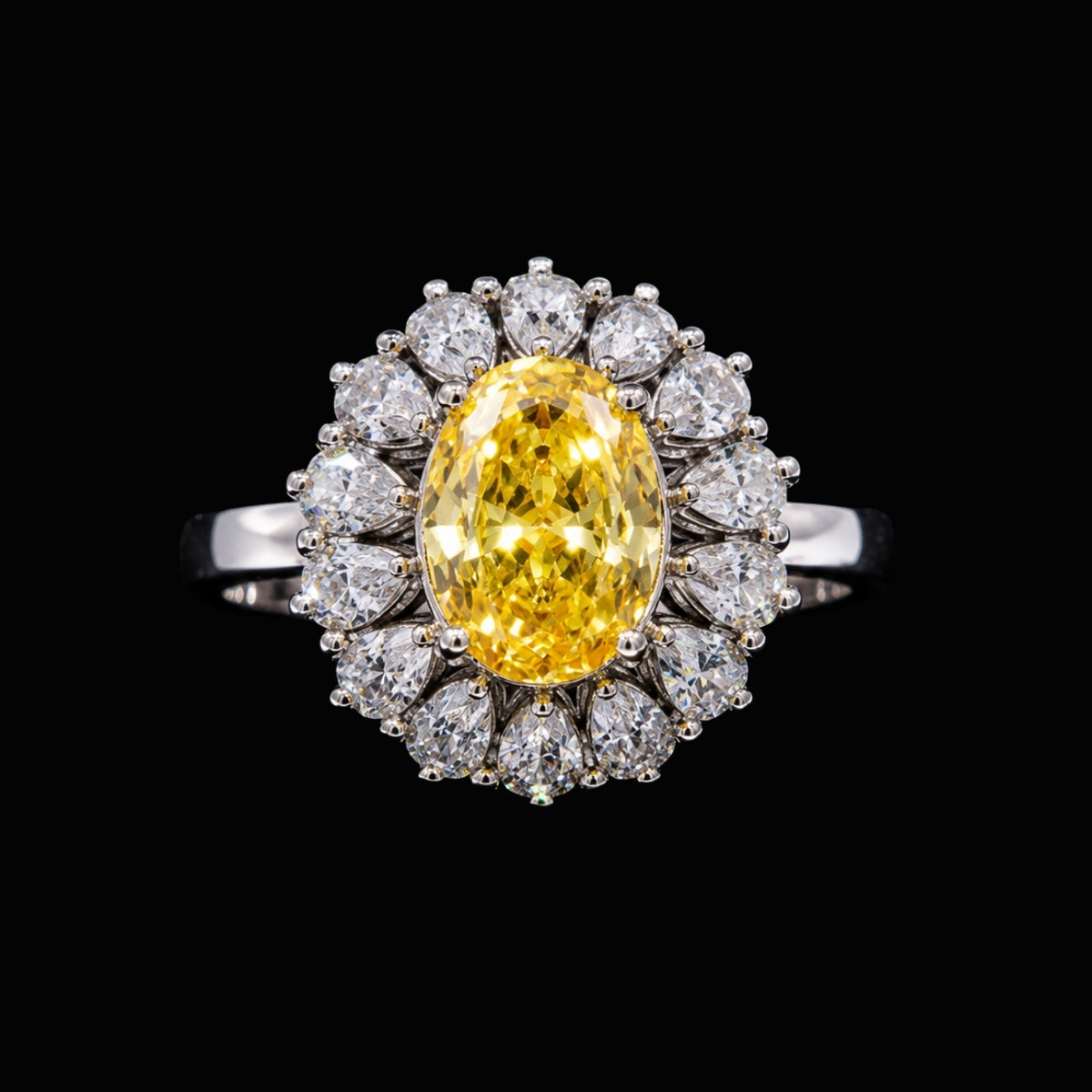 A silver-tone ring with a yellow oval-cut CZ stone surrounded by smaller clear CZ stones.