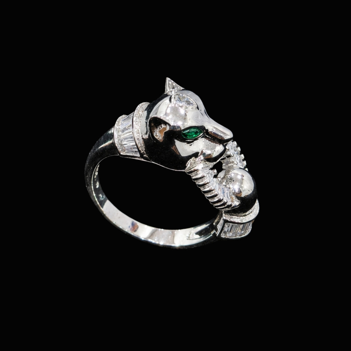 A silver ring with a panther motif and clear CZ stones.