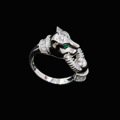 A silver ring with a panther motif and clear CZ stones.
