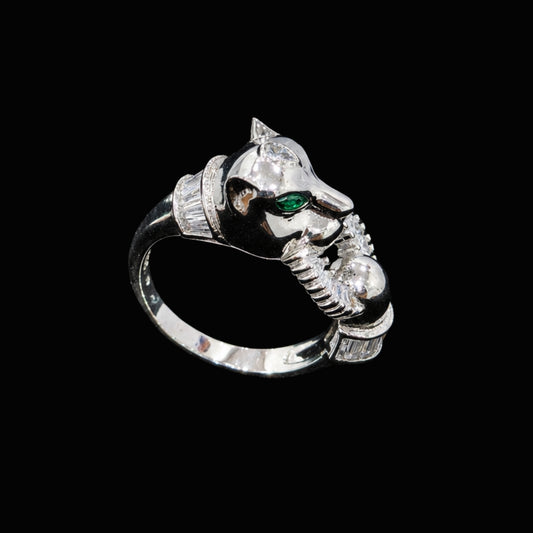A silver ring with a panther motif and clear CZ stones.