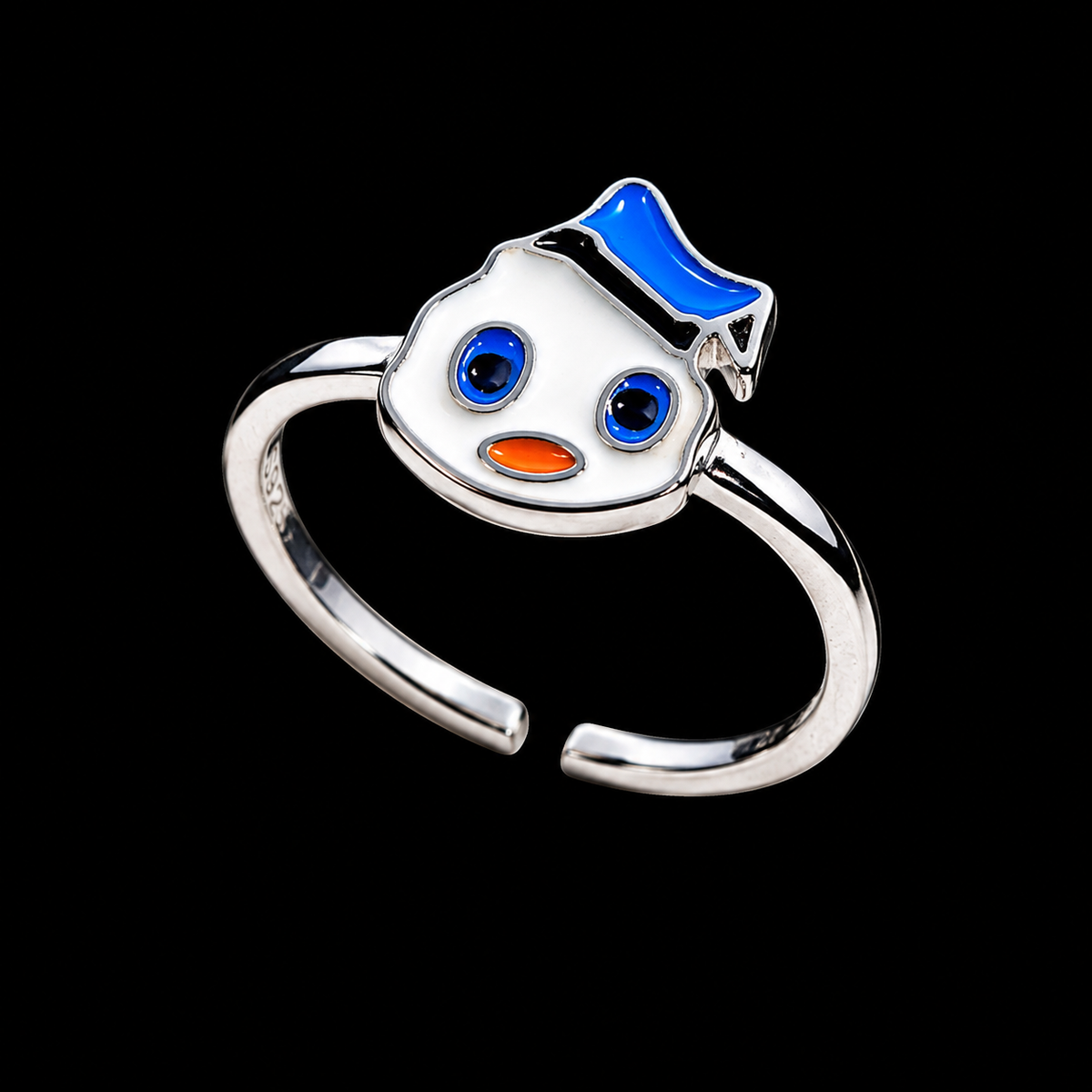 A silver-tone ring featuring a snowman face design with enamel details.