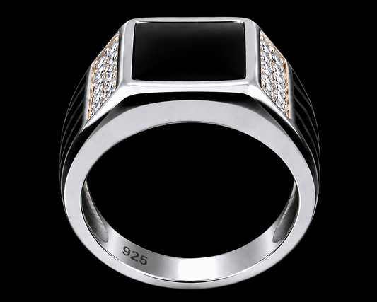 A silver ring with a square black stone and CZ stones on the sides.