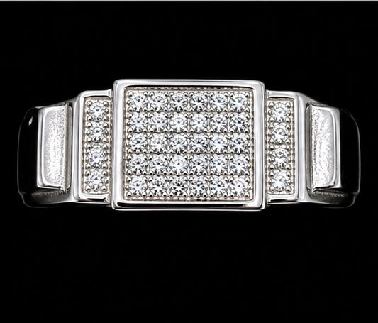 A silver ring with a square design and CZ stones.
