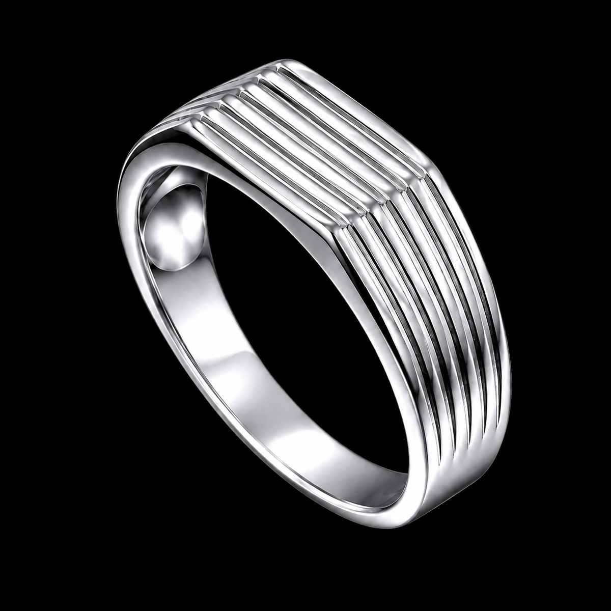 A silver ring with enamel work on a plain background