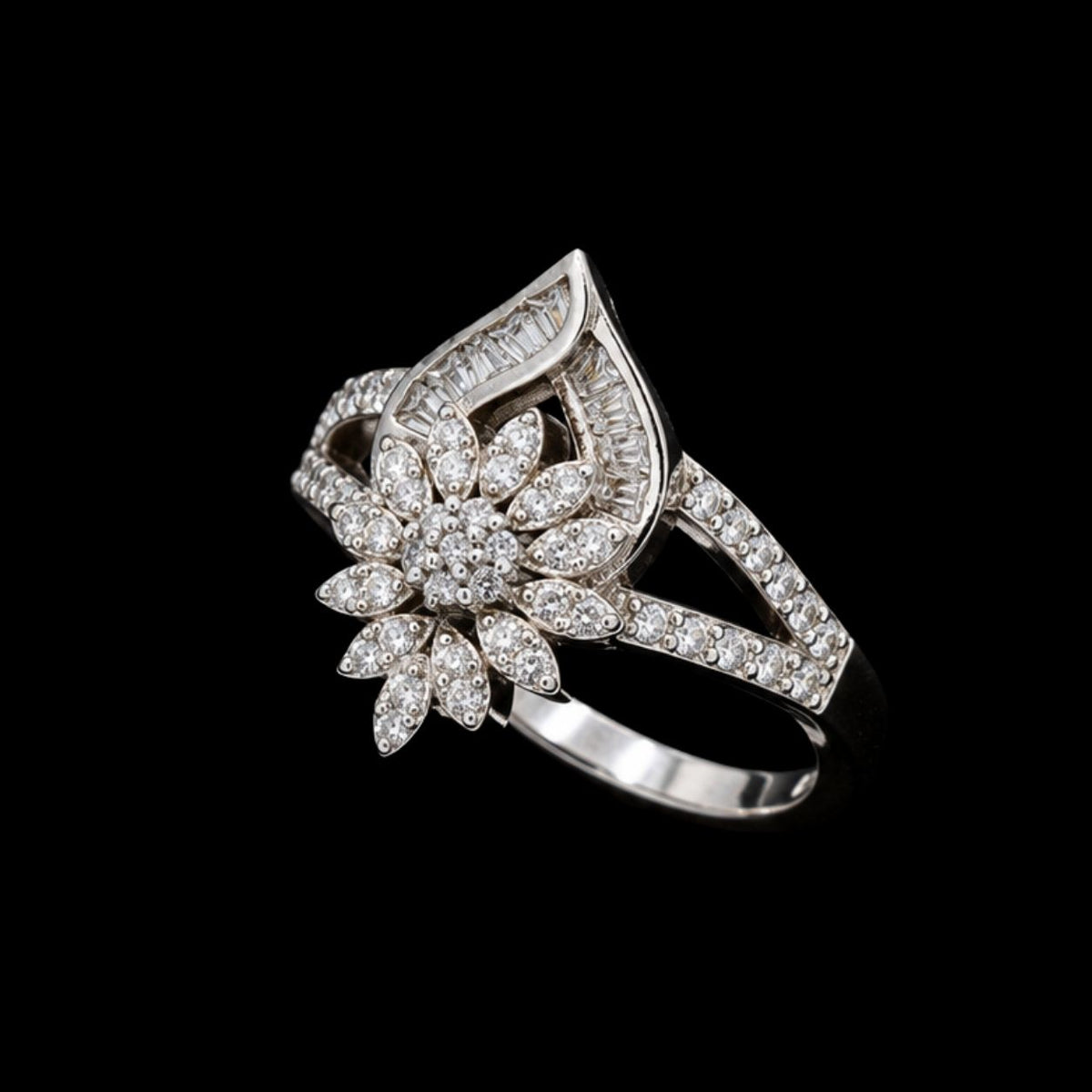 A silver ring with a floral design and CZ stones.
