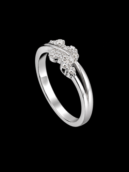 A silver ring with a cluster of clear cubic zirconia stones on a black background.