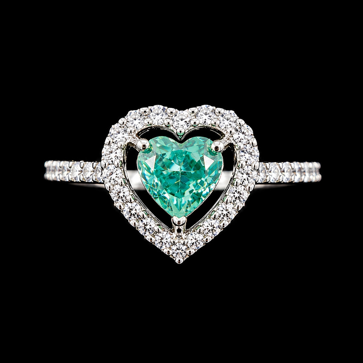 A heart-shaped ring with CZ stones and a silver-tone finish.