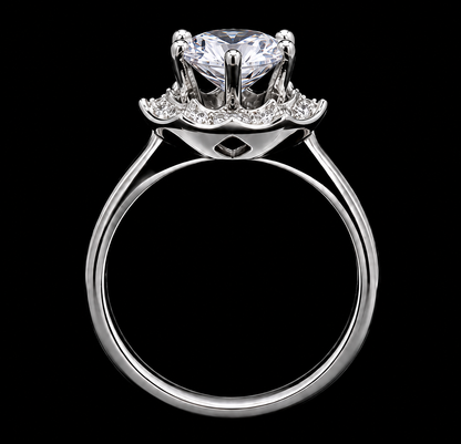 A silver-tone ring with a large clear cubic zirconia stone and a crown-like setting.