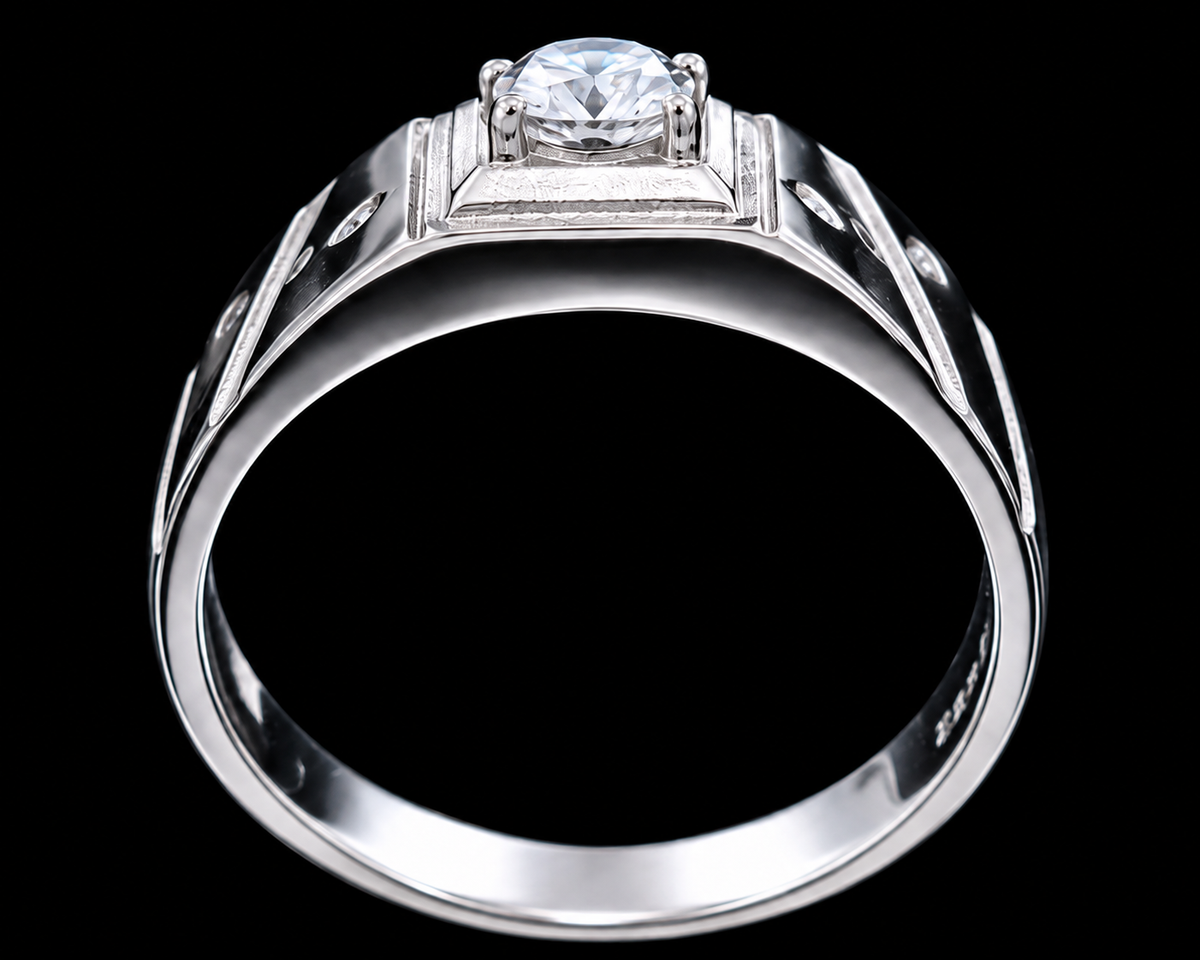 A silver ring with a round-cut CZ stone in the center, set against a plain background.