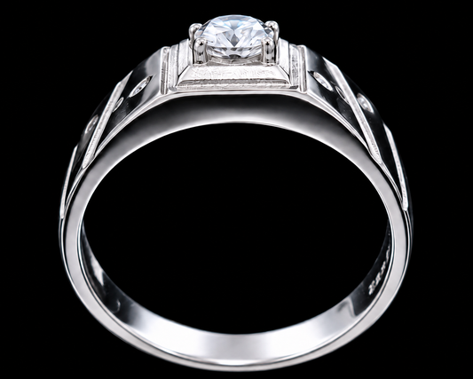A silver ring with a round-cut CZ stone in the center, set against a plain background.
