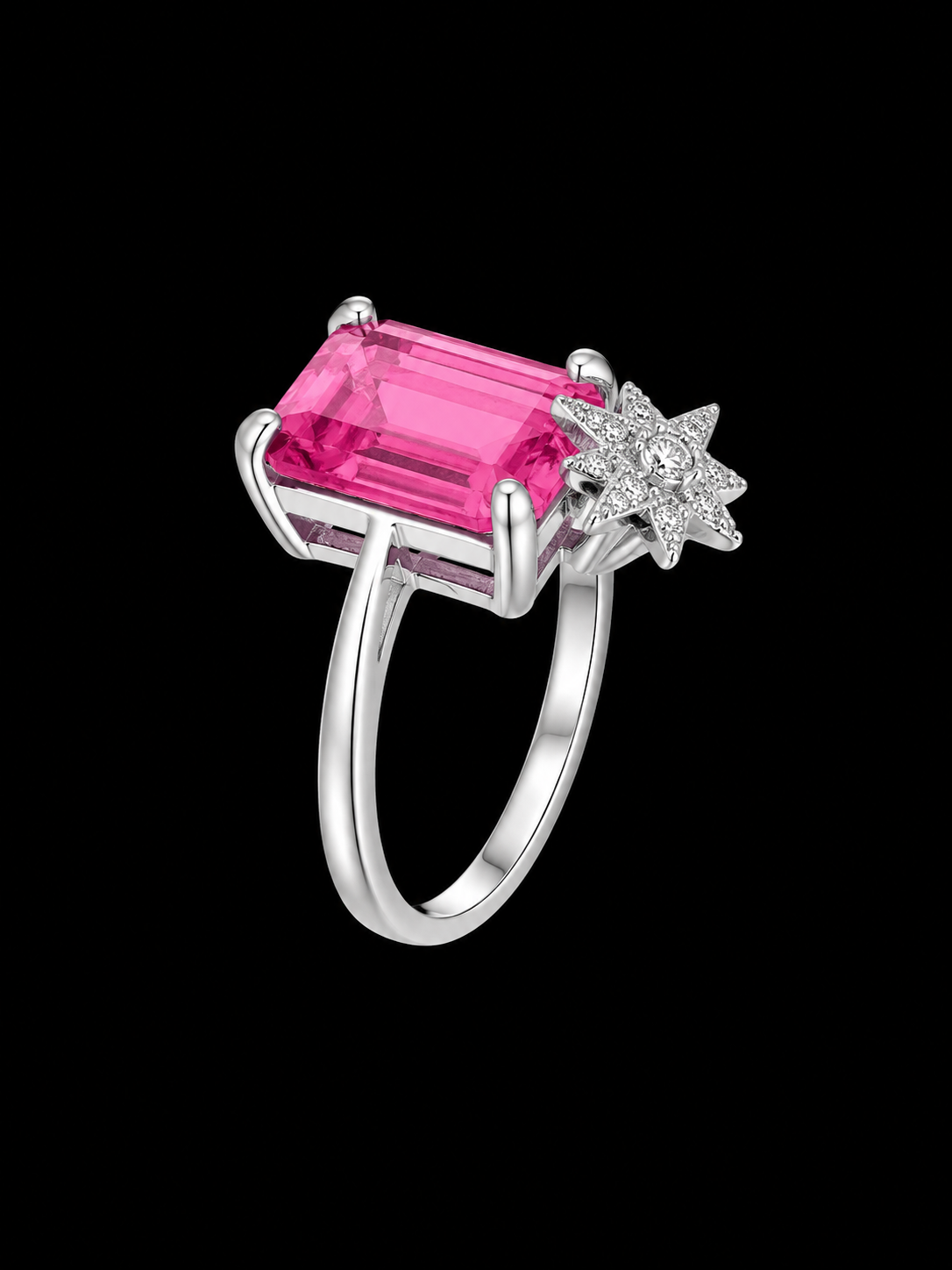 A silver-tone ring with a pink CZ stone