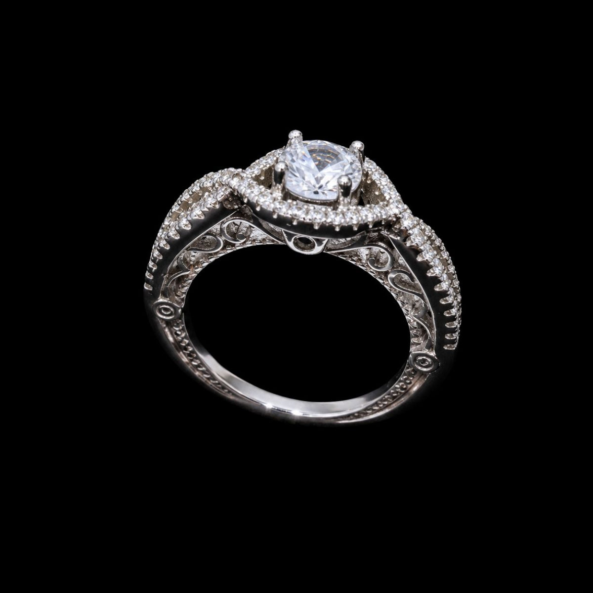 A silver ring with a CZ stone and enamel work