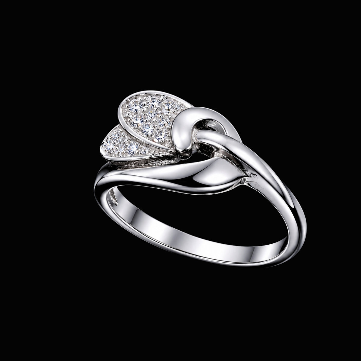 A silver ring with a knot design and clear cubic zirconia stones.