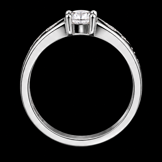 A silver ring with a round-cut cubic zirconia stone, set in a simple band.