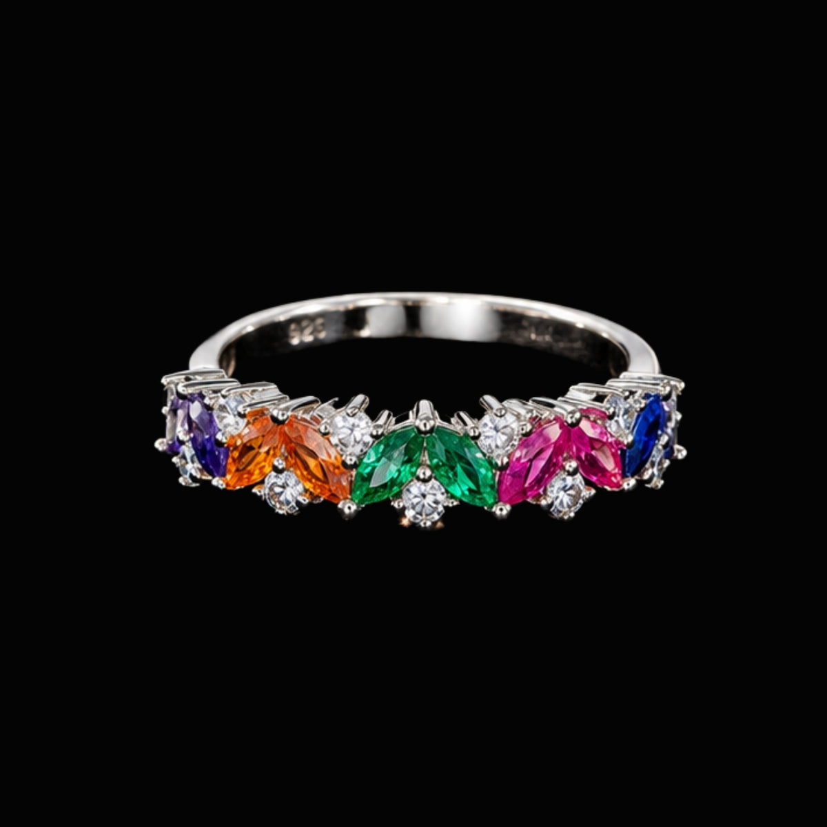 A silver tone ring with a row of rainbow-colored CZ stones.