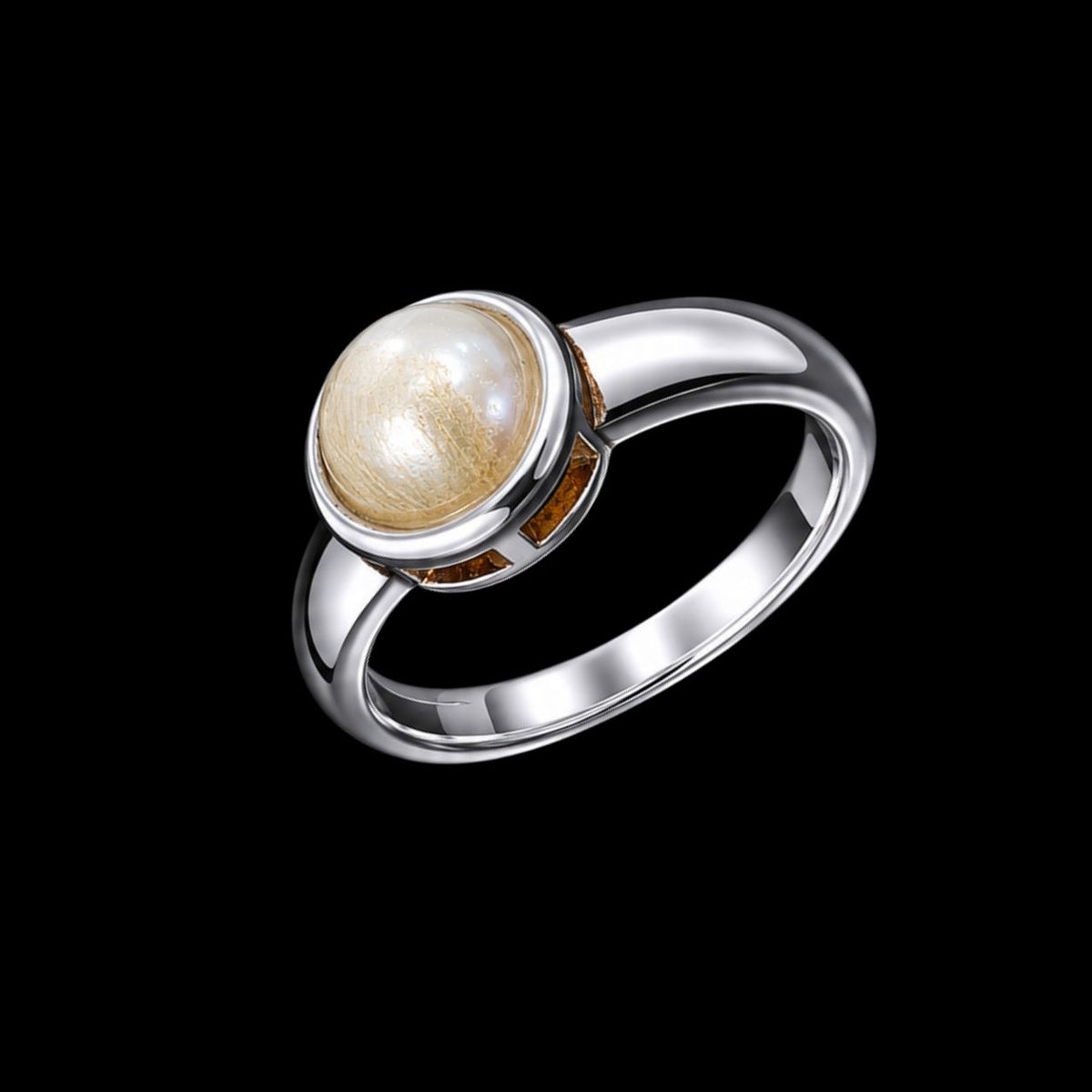 A pearl ring with a round pearl and silver-tone band.