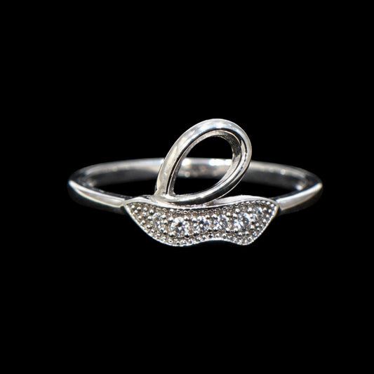 A silver ring with a wavy design and CZ stones.