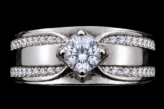 A silver ring with a large round-cut clear cubic zirconia stone in the center, surrounded by smaller stones on either side.