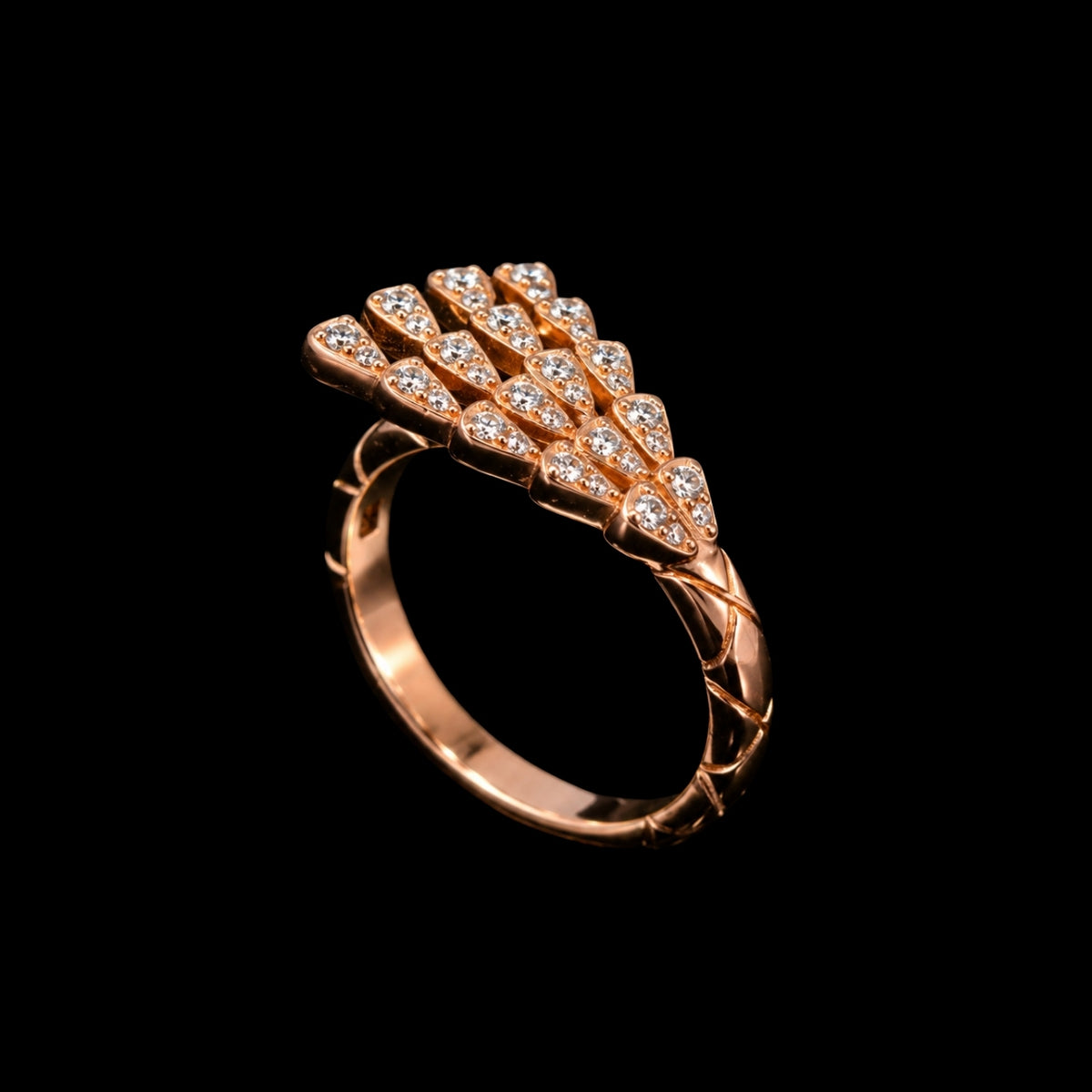 A delicate and elegant ring featuring a row of sparkling CZ stones set in a gold-tone metal tone.
