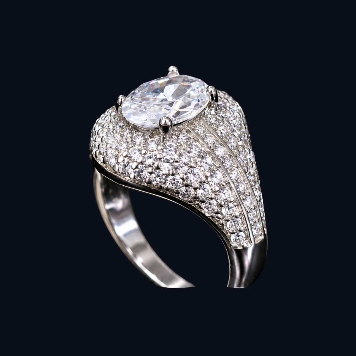 A silver-tone ring with a large oval-cut CZ stone and smaller round-cut CZ stones.