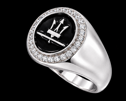 A silver ring with a black enamel Maserati logo and clear CZ stones