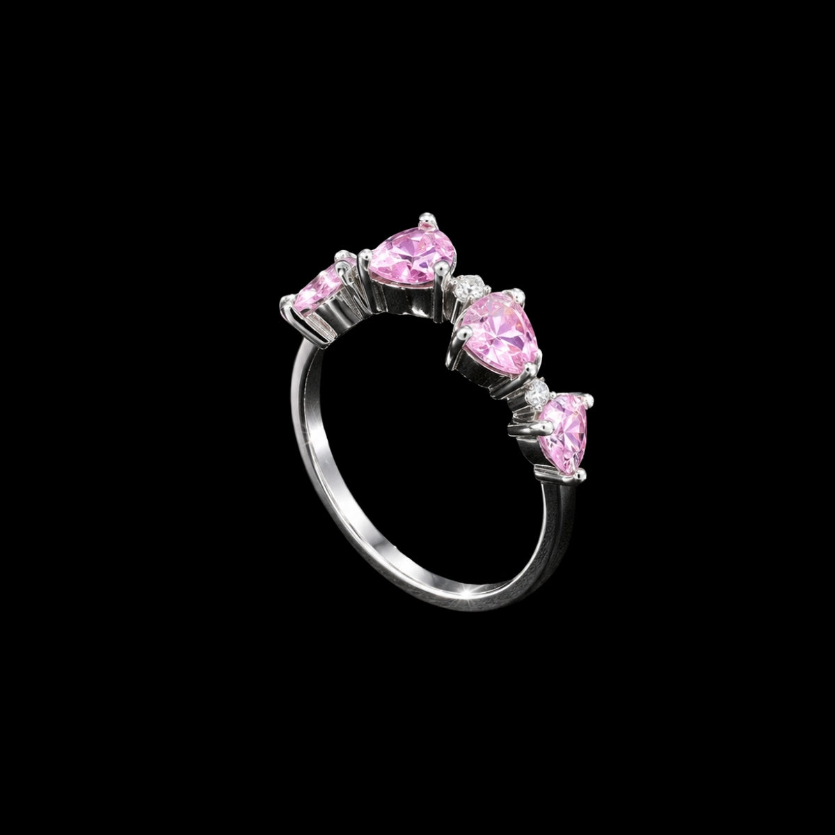 A silver ring with three pink CZ stones, set in a minimalist geometric design.