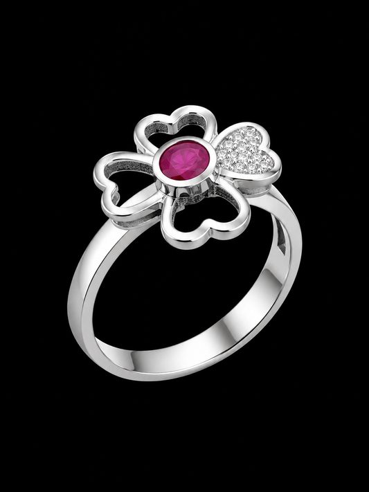 A silver-tone ring with a flower design and CZ stones.