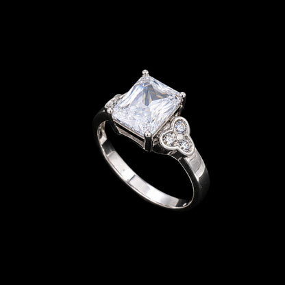A square-cut CZ ring with a silver-tone band