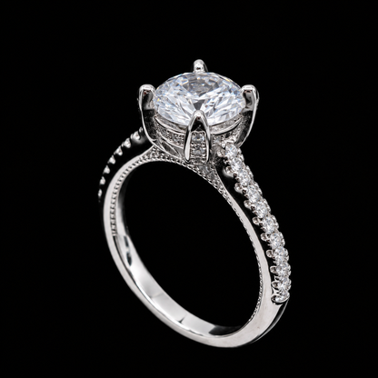A silver-tone ring with a large oval-cut cubic zirconia stone and smaller stones on the band.