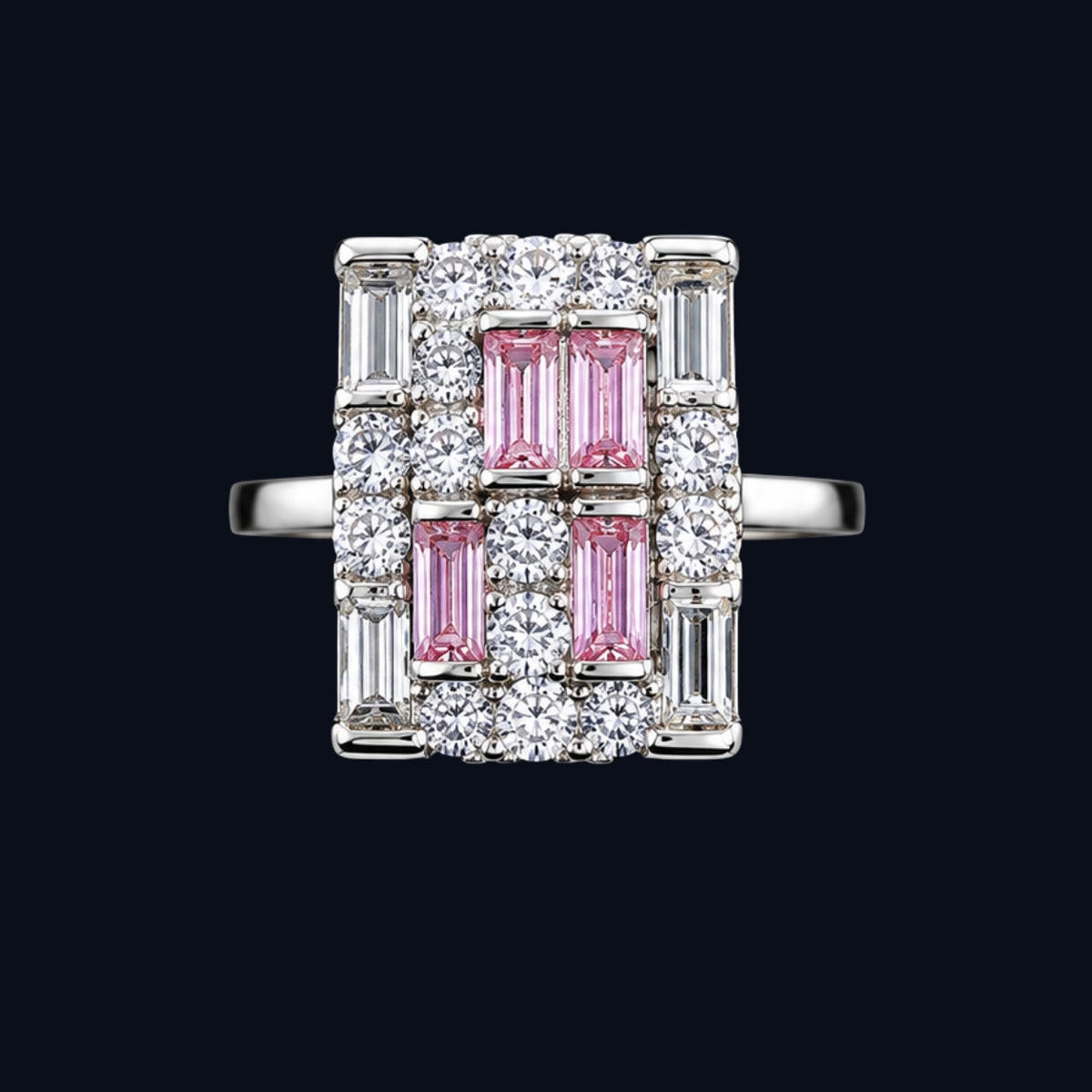 A silver-tone ring with pink and clear cubic zirconia stones in a geometric design.