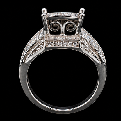 A silver ring with intricate details and sparkling CZ stones.