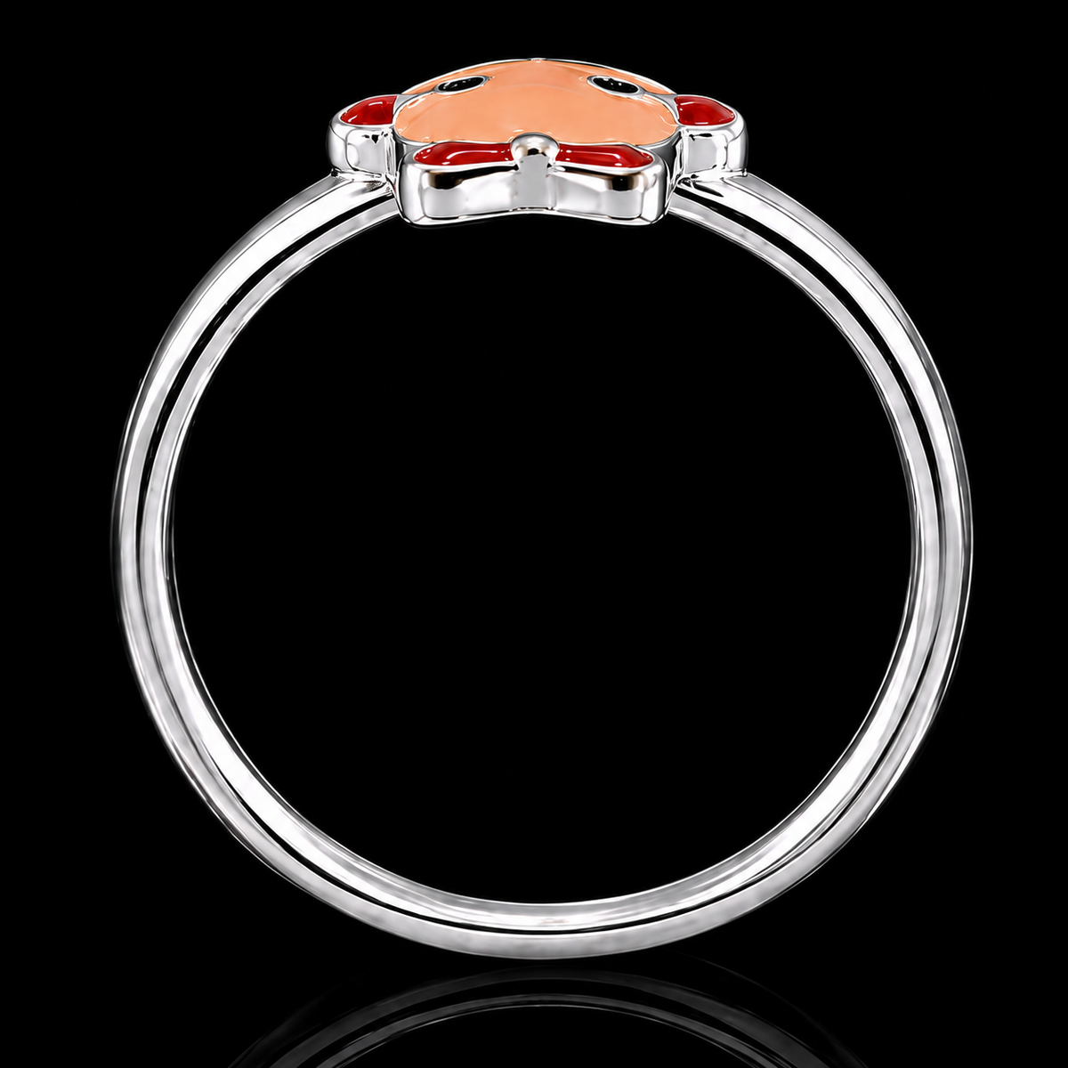 A silver ring with an enamel flower design on a black background