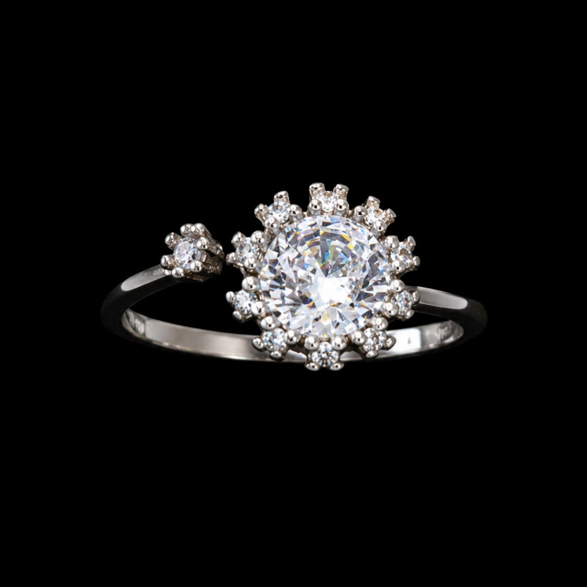 Elegant silver ring with CZ stones on a black background