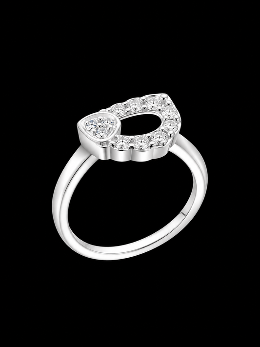 A silver ring with a CZ stone design, featuring a minimalist style.